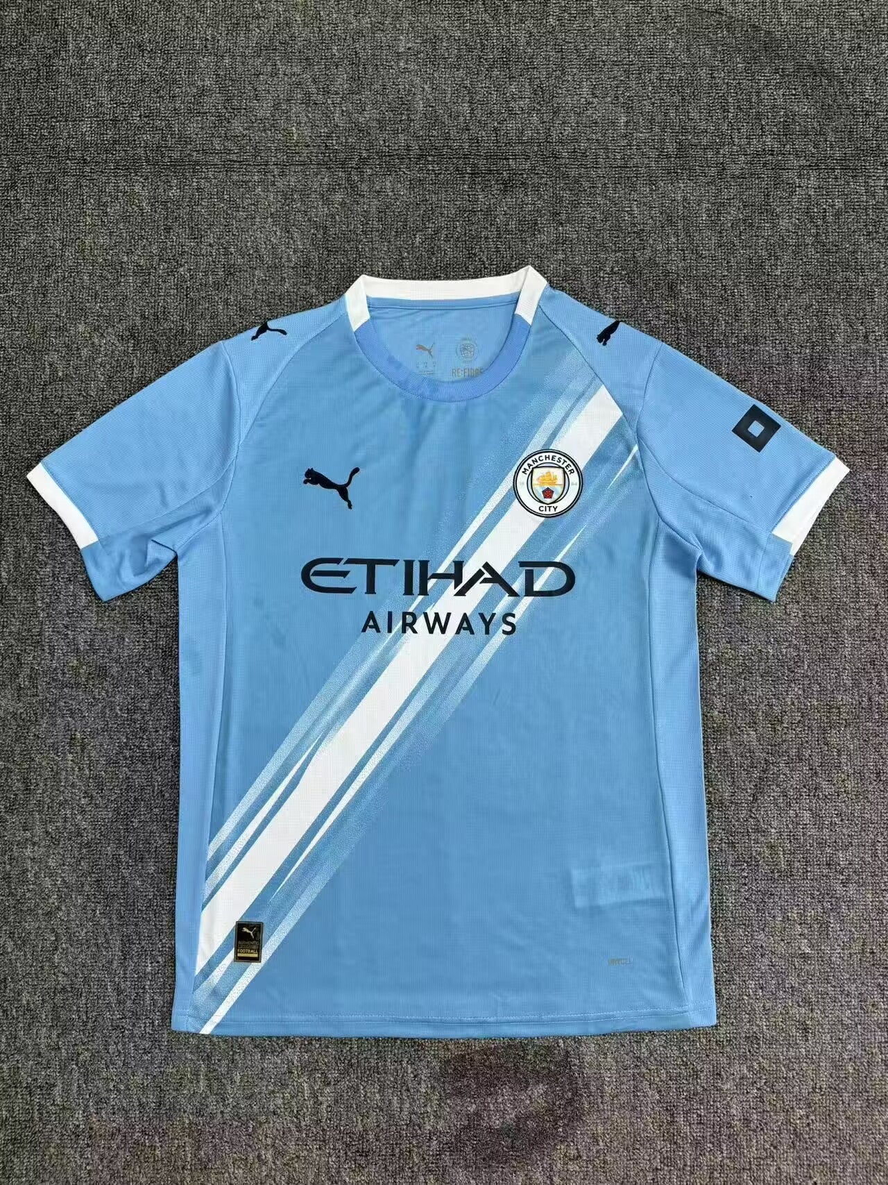 25/26 Manchester City Local - Aficionado